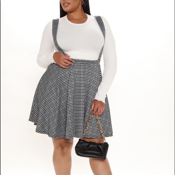 Fashion Nova Dresses & Skirts - Two piece. Long sleeve shirt w/ mini skirt
